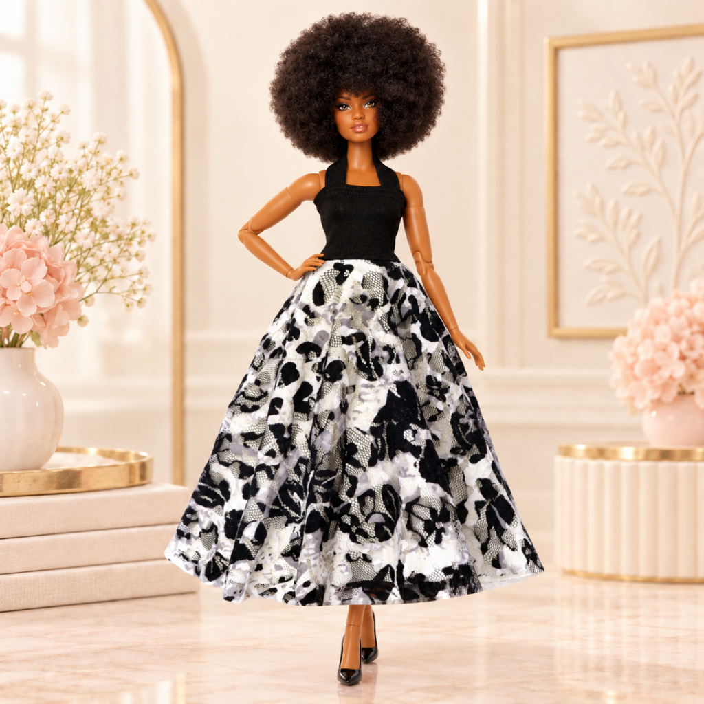 Fashion doll in a black halter top and a full black and white floral lace skirt, in a cream room with flowers