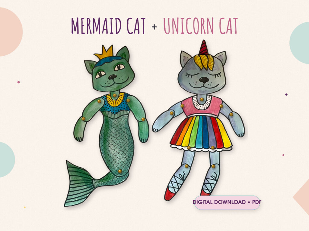 Unicorn cat paper doll and mermaid cat paper doll assembled with brads: a green cat with a crown and a fish tail, and a grey cat with a horn, a rainbow skirt and red ballet shoes; digital download PDF