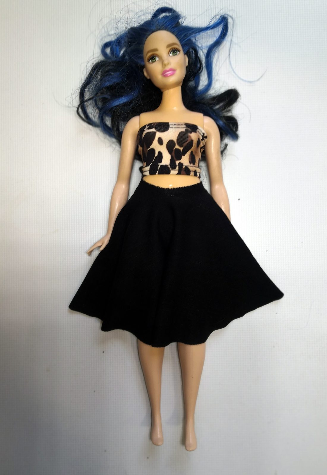 The circle skirt tied on an 11.5 inch fashion doll, worn with a tube top